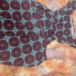 Blue and purple crop top and flare pants set